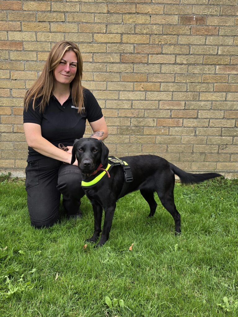 Detection Dog Ember with handler Michelle